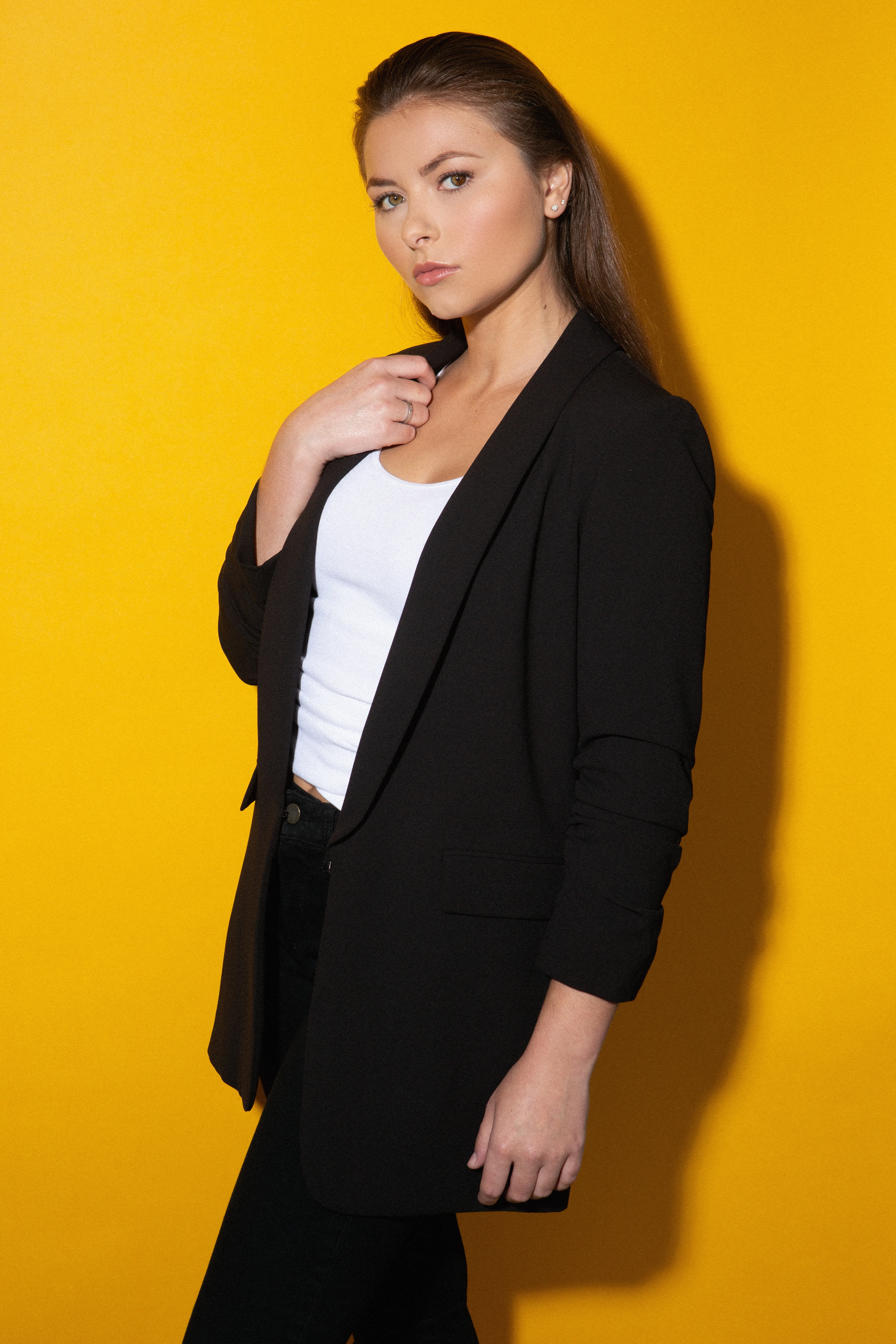 Professional yellow blazer studio shot